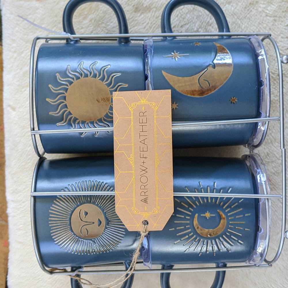 COPY - Arrow & feather stackable mug set.  Celestial detail